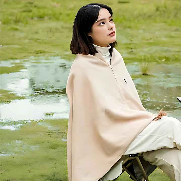 "Tragbare USB-Heizdecke aus weichem Fleece, vielseitig als Schal oder Überwurf nutzbar, ideal für Reisen und Zuhause."