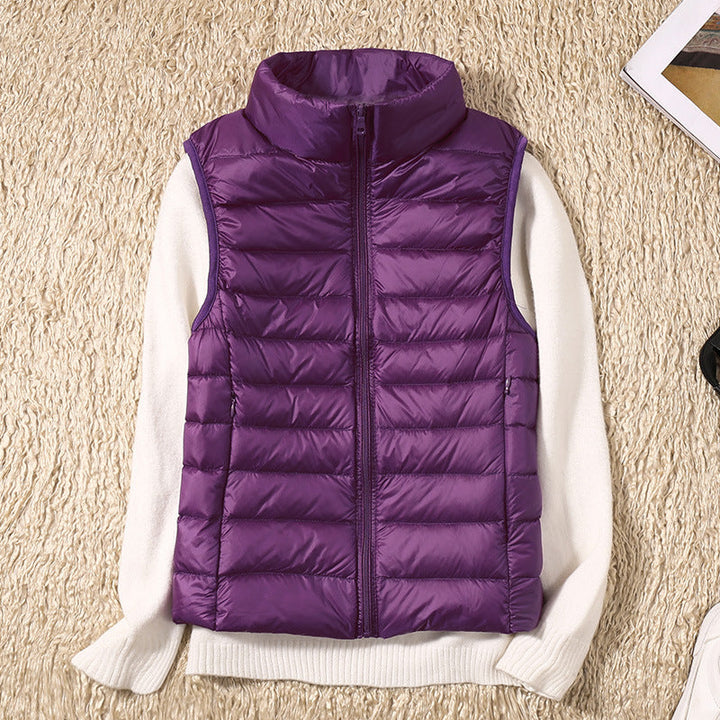 Ultraleichte Damen Daunenweste, elegant violett, winddicht, vielseitig kombinierbar, ideal für kalte Tage und lässige Ausflüg
