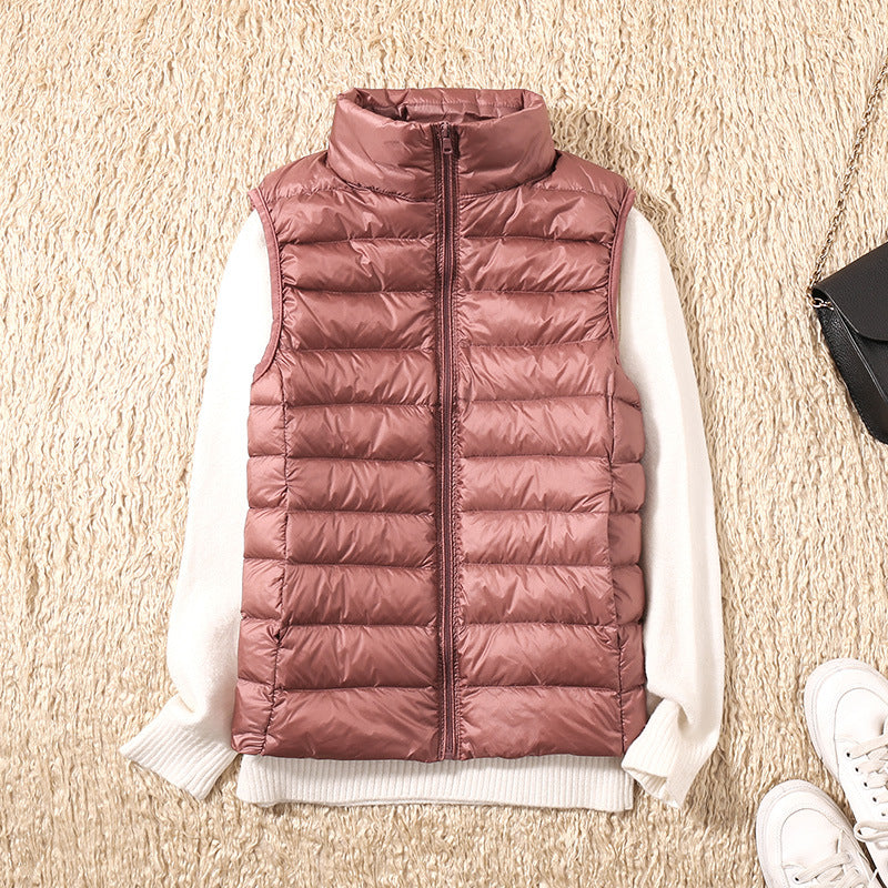 Ultraleichte Damen Daunenweste, elegant violett, winddicht, vielseitig kombinierbar, ideal für kalte Tage und lässige Ausflüg