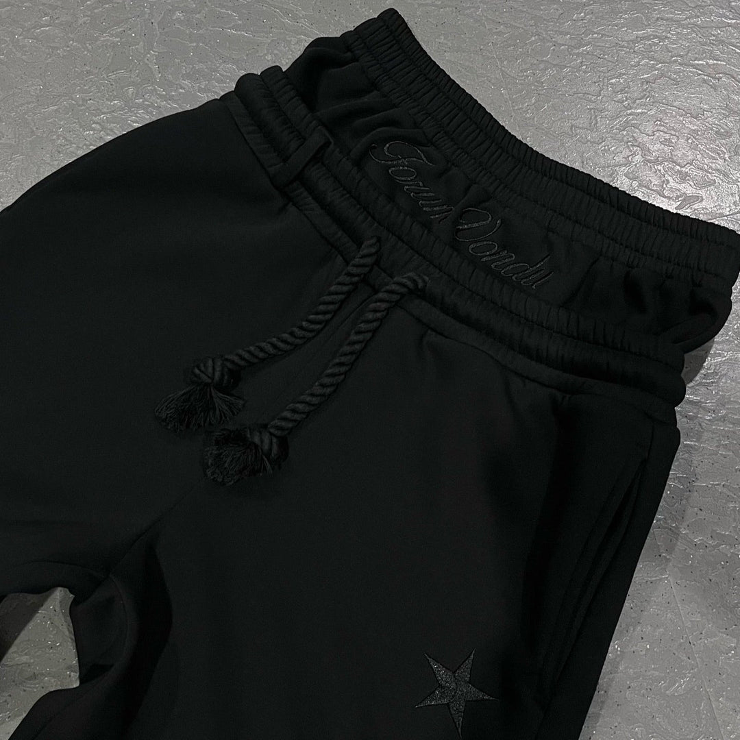 Unisex Baggy Sweatpants in Grau, lässiger Schnitt mit verstellbarem Bund und Taschen für Komfort und moderne Optik.