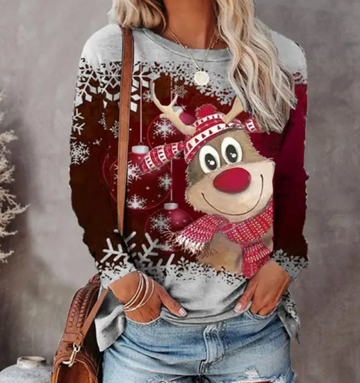 "Weihnachtspullover mit festlichem Design, rote und grüne Farben, gemütlich, perfekte Wahl für kalte Tage und Weihnachten."