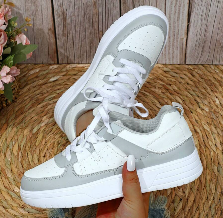 "Weiß, Blau, Schwarz und Rosa Damen-Sneakers mit farbigem Design für Komfort und Stil"