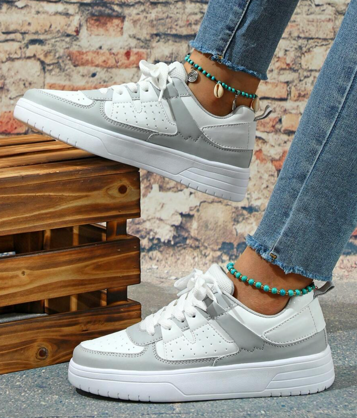 "Weiß, Blau, Schwarz und Rosa Damen-Sneakers mit farbigem Design für Komfort und Stil"