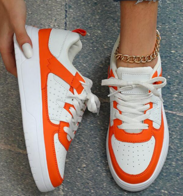"Weiß, Blau, Schwarz und Rosa Damen-Sneakers mit farbigem Design für Komfort und Stil"