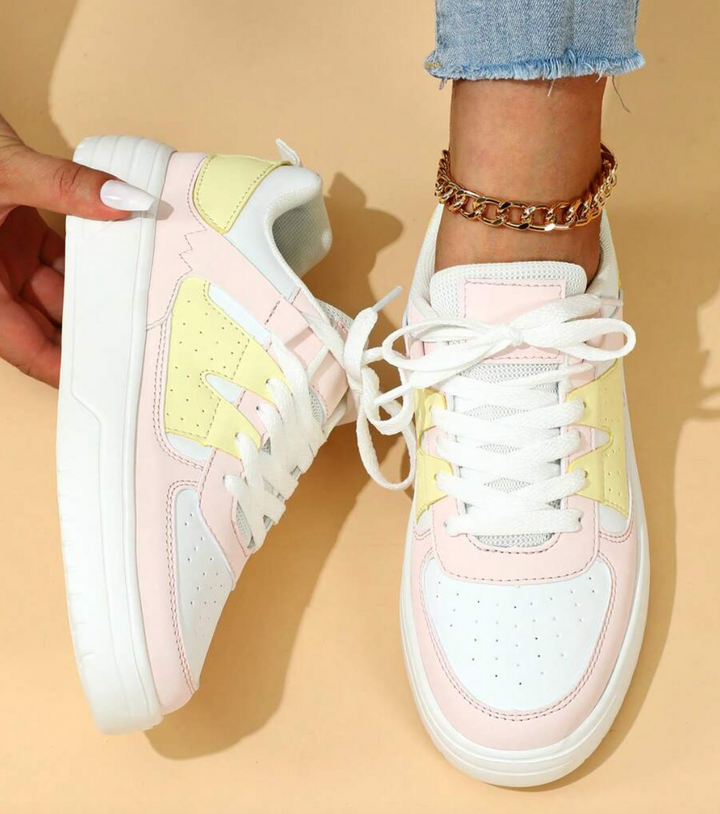 "Weiß, Blau, Schwarz und Rosa Damen-Sneakers mit farbigem Design für Komfort und Stil"