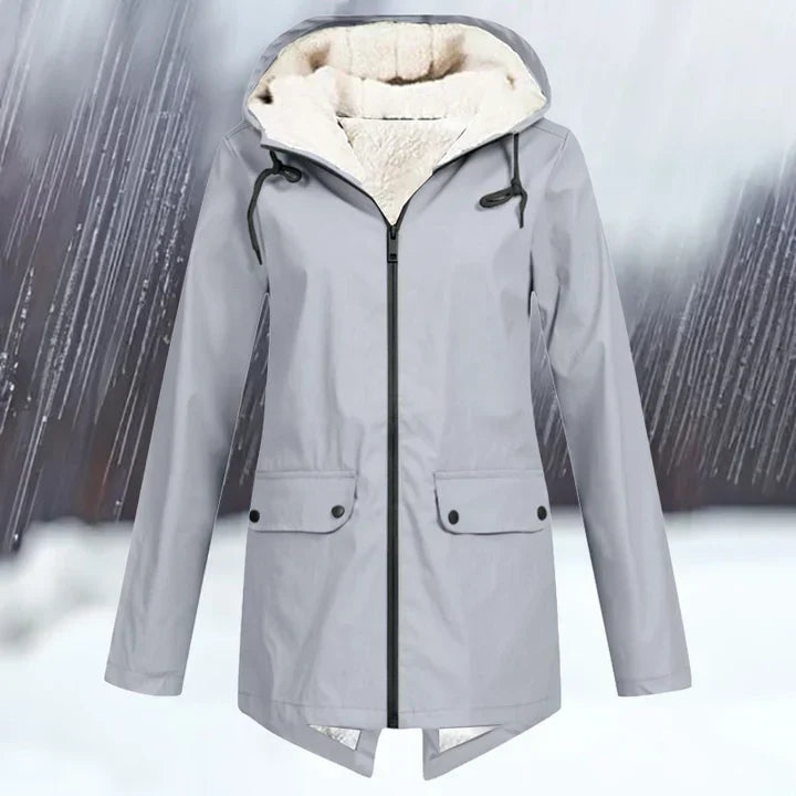 "Wind- und wasserdichte Damenjacke mit verdickter Kapuze, stilvolles Design, ideal für kaltes und nasses Wetter."