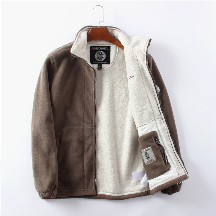 Winddichte Herren Fleece Jacke, grau, elegant, atmungsaktiv, mit versteckten Taschen, ideal für kalte Herbst- und Wintertage.