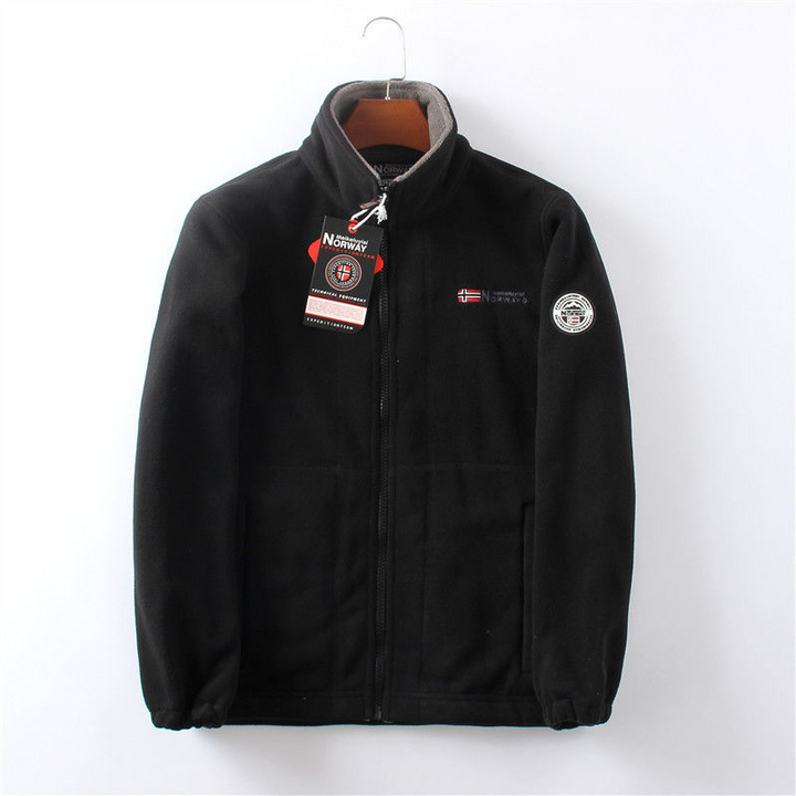 Winddichte Herren Fleece Jacke, grau, elegant, atmungsaktiv, mit versteckten Taschen, ideal für kalte Herbst- und Wintertage.