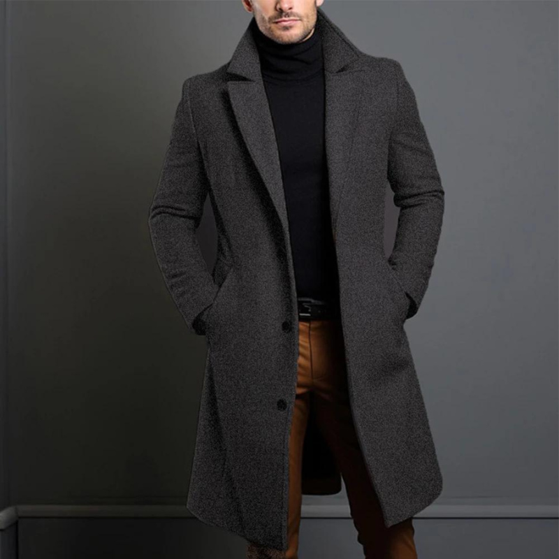 "Wollmantel für Männer, elegant geschnitten in Schwarz mit hohem Kragen, ideal für stilvolle Wintermode"